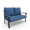Blue cushioned loveseat with black metal frame on a white background