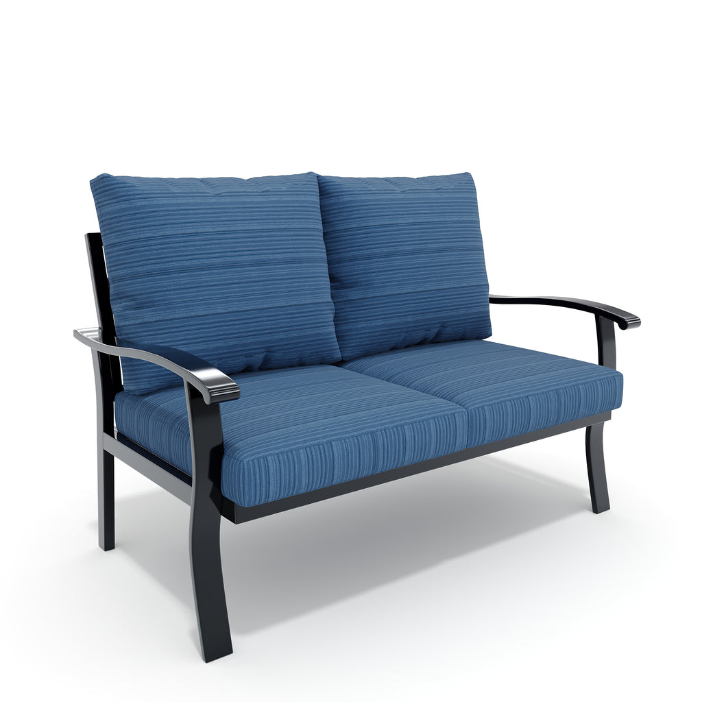 Blue cushioned loveseat with black metal frame on a white background