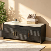 Black HOMREST shoe storage bench beside a woven basket in an entryway.