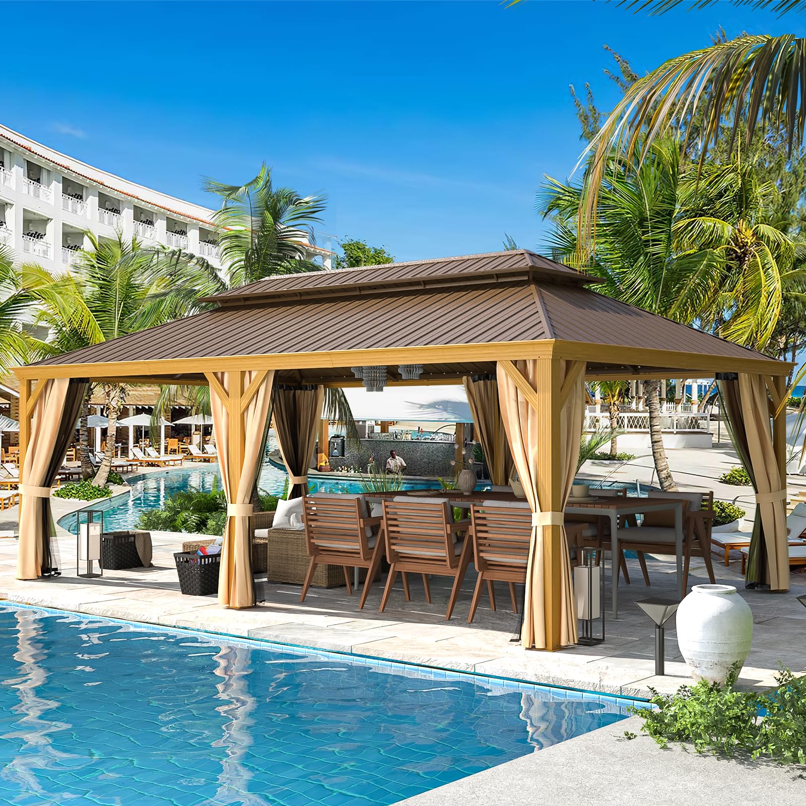 Wooden gazebo with curtains by a poolside in a tropical setting
