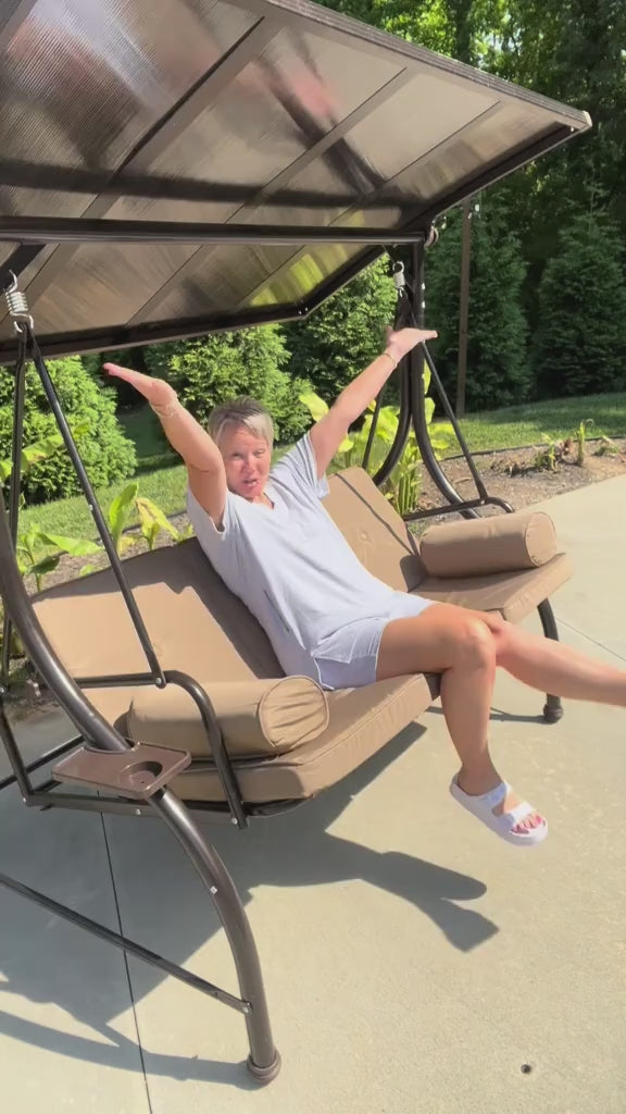 Load video: HOMREST 57in Outdoor Patio Swing with Hardtop,  Convertible Backrest Swing Bed with Cushion, 2 Pillows