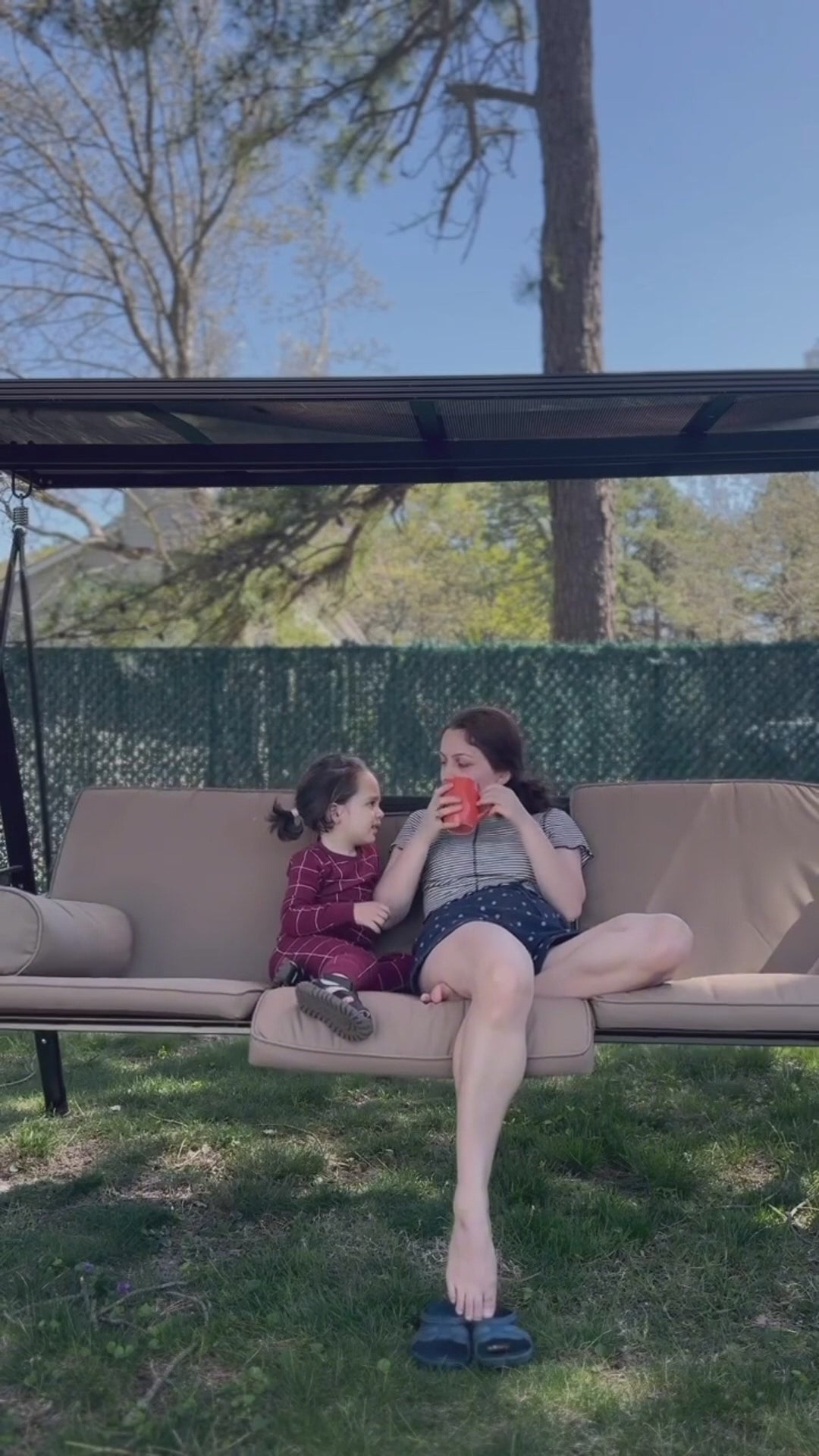 Load video: HOMREST Porch Swing with Hardtop Sunshade, 3 Seat with 2 Side Cup Holder with Cushion, 2 Pillows for Front Outdoor Porch Lawn Khaki