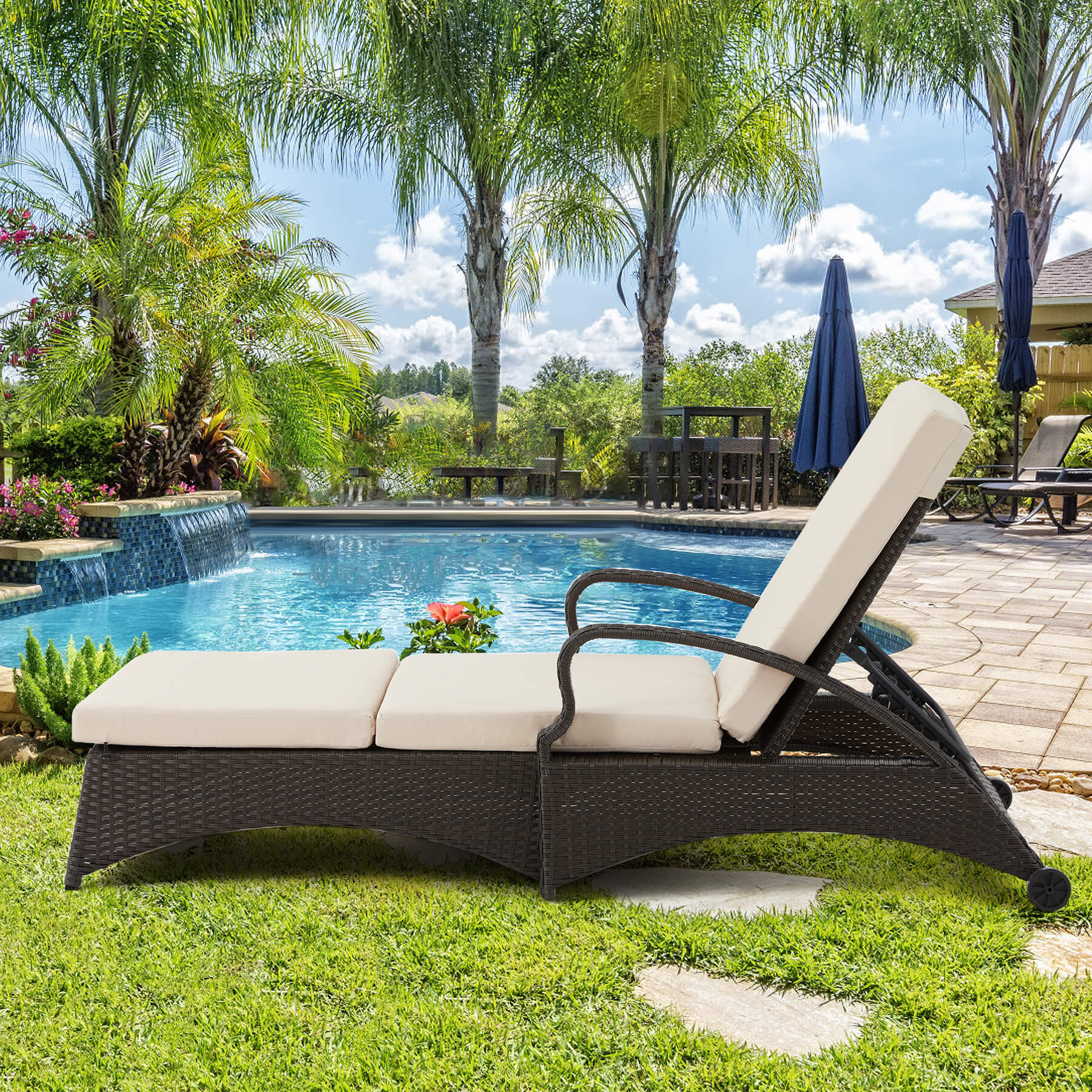  Homrest outdoor lounge chaiise with black rattan and beige cushions for poolside